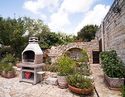 Trullo Paan Pascarosa Ostuni by Typney