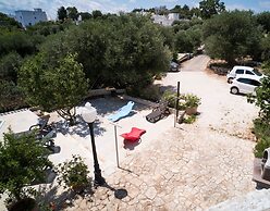 Trullo Paan Pascarosa Ostuni by Typney