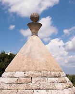 Trullo Paan Pascarosa Ostuni by Typney