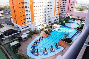 Tranquil 2BR @ Green Pramuka Apartment
