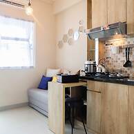 Modern and Bright 2BR Green Pramuka Apartment