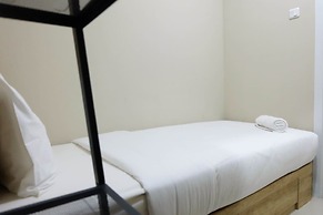 Modern and Bright 2BR Green Pramuka Apartment