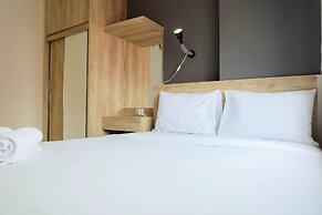 Modern and Bright 2BR Green Pramuka Apartment