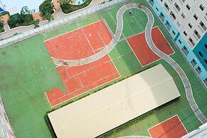 Modern and Bright 2BR Green Pramuka Apartment