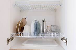 Modern and Bright 2BR Green Pramuka Apartment