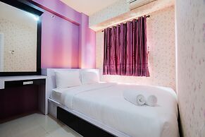 Homey 1BR with Spacious Living Room and Sofa Bed Green Pramuka Apartme