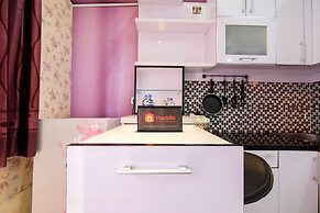 Homey 1BR with Spacious Living Room and Sofa Bed Green Pramuka Apartme