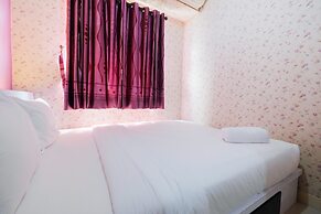 Homey 1BR with Spacious Living Room and Sofa Bed Green Pramuka Apartme