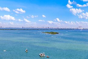 Bayfront Gem With Balcony and Pool