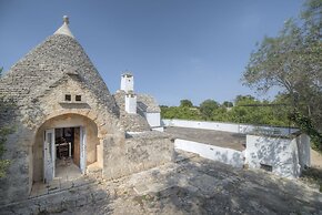 Trullo Grotta Cisternino by Typney