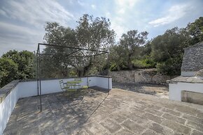 Trullo Grotta Cisternino by Typney