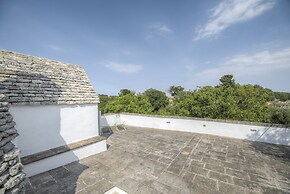 Trullo Grotta Cisternino by Typney