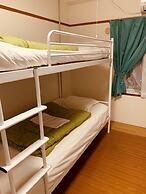 Guesthouse Shiawase Eki - Hostel