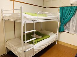 Guesthouse Shiawase Eki - Hostel
