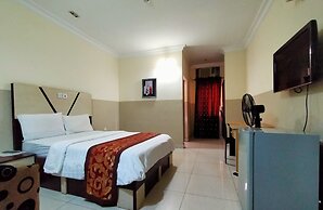 Joy House Hotel and Suites