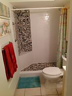 Charming 1 Bedroom, 3 Minute Walk To The Beach Condo by RedAwning