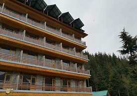 Gezellig Inn - Vardhan Hills