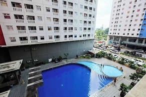 Homey and Relaxing 2BR Green Pramuka Apartment