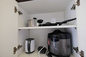 Homey and Relaxing 2BR Green Pramuka Apartment