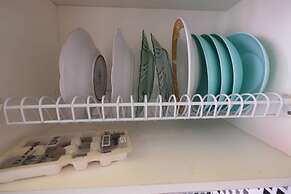 Homey and Relaxing 2BR Green Pramuka Apartment