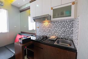 Homey and Relaxing 2BR Green Pramuka Apartment