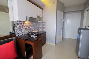 Homey and Relaxing 2BR Green Pramuka Apartment