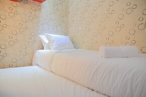 Homey and Relaxing 2BR Green Pramuka Apartment