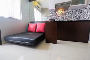 Homey and Relaxing 2BR Green Pramuka Apartment