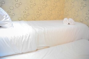 Homey and Relaxing 2BR Green Pramuka Apartment