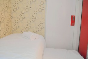 Homey and Relaxing 2BR Green Pramuka Apartment