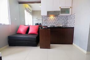 Homey and Relaxing 2BR Green Pramuka Apartment