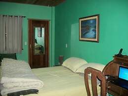 Gato de Botas Flats & Suites