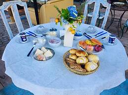 Gato de Botas Flats & Suites