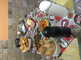 Gato de Botas Flats & Suites