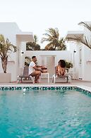 The Palm Leaf Apartments