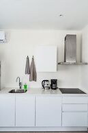 The Palm Leaf Apartments