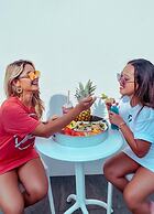 The Palm Leaf Apartments