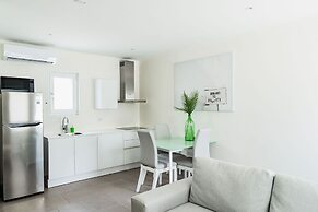 The Palm Leaf Apartments