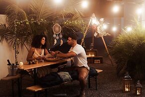 The Palm Leaf Apartments