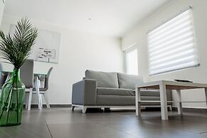 The Palm Leaf Apartments