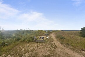 Beach Front On The Bay In Our Rustic Beach 4 Bedroom Cottage by RedAwn