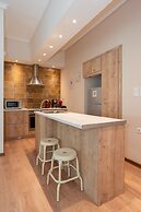 Contemporary Apartment made of Wood and Stone