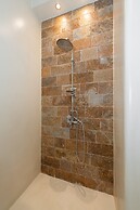 Contemporary Apartment made of Wood and Stone