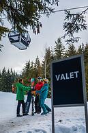 Blackcomb Springs Suites by CLIQUE