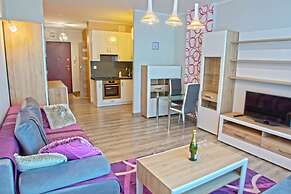 Violet Triton Apartment