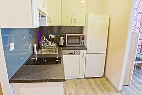 Violet Triton Apartment