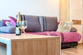 Violet Triton Apartment