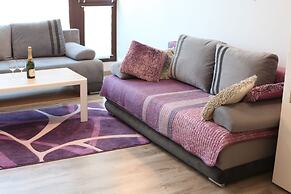 Violet Triton Apartment