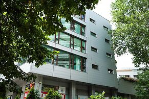 Violet Triton Apartment