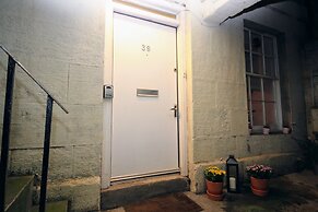 Silver Lining - St Patrick Sq Apartment